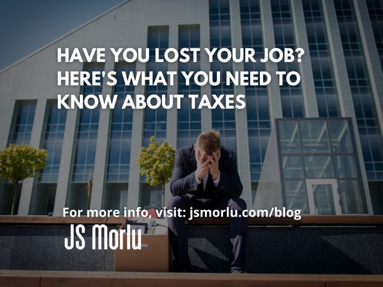 A distressed man in a suit sits with his hand on his face, with an office building in the background - Tax/Lost Job