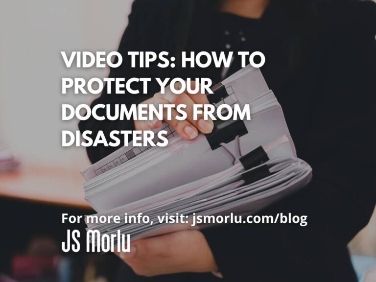 Close-up image of a woman holding a stack of file clips in her hands - disaster preparedness.