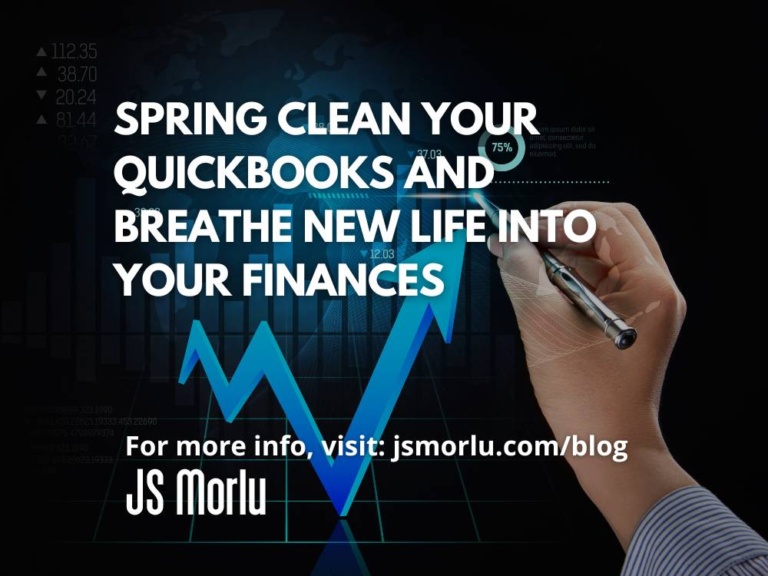 Hand holding pen, illustrating financial concept with charts and graphs on paper - Spring Clean Quickbooks