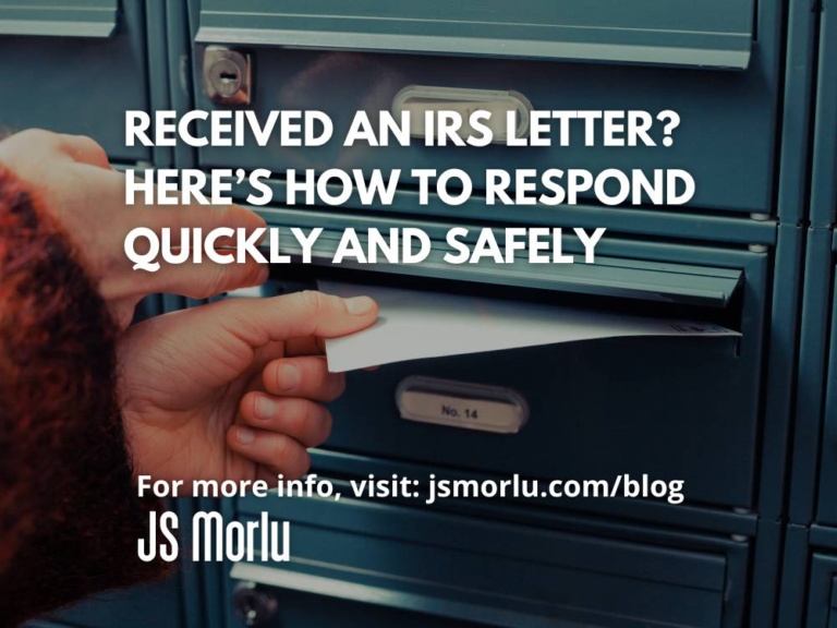 Closeup of a woman's hand inserting a letter into a mailbox - IRS Letters
