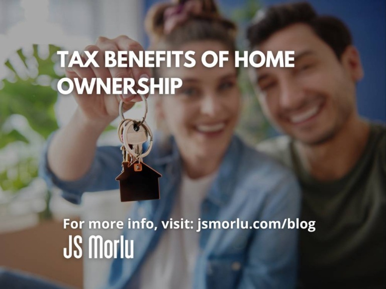 Blurry image of a couple joyfully holding keys - Tax Benefits Home Ownership