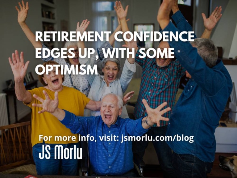 Group of seniors expressing happiness at a retirement facility.