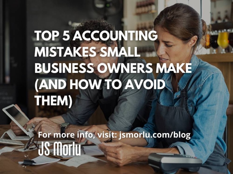 A man and woman are sitting at a table in a cafeteria, looking at papers and discussing finances - Small business