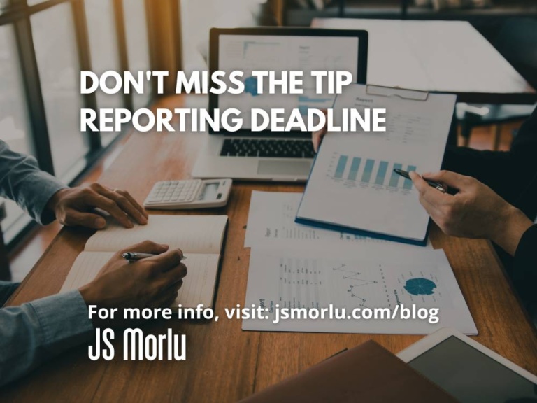 business partnership pointing to the graph of the company financial statements report and profits earned during in the office - Reporting