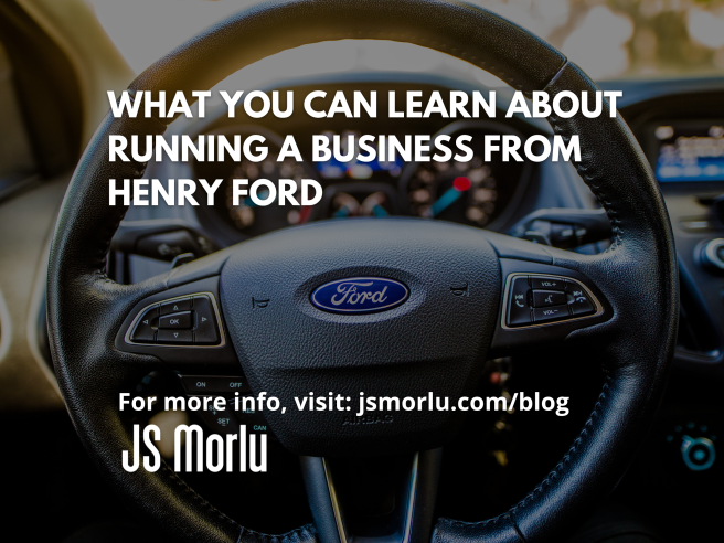 Close-up of a Ford steering wheel with visible controls and logo in the center - Business, Henry Ford.