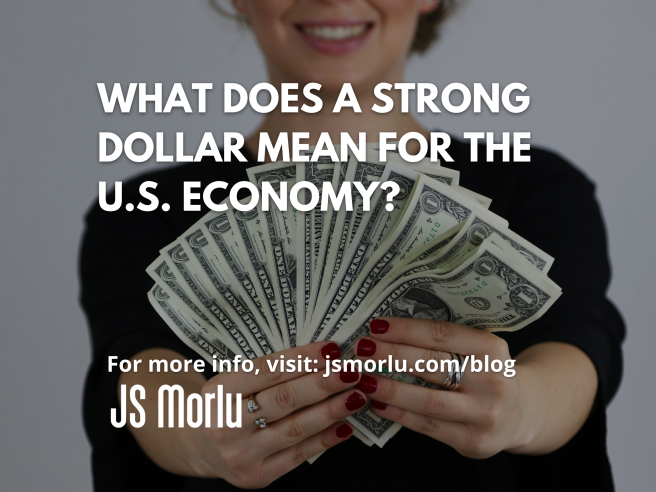 A woman holds a substantial amount of cash in her hands - U.S. Dollar