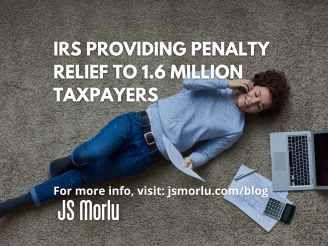 A woman relaxes on the floor, engrossed in a phone call while holding a document - taxpayers.