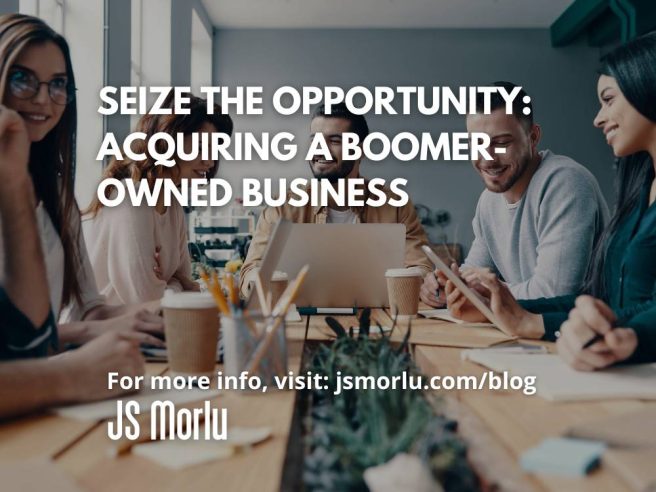 Group of young professionals in smart casual attire discussing and smiling while collaborating in a creative office setting - Boomer-owned business