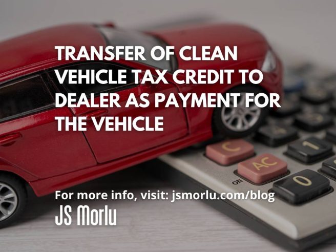 Red toy car perched on a calculator, highlighting the potential financial benefit of claiming the clean vehicle tax credit.