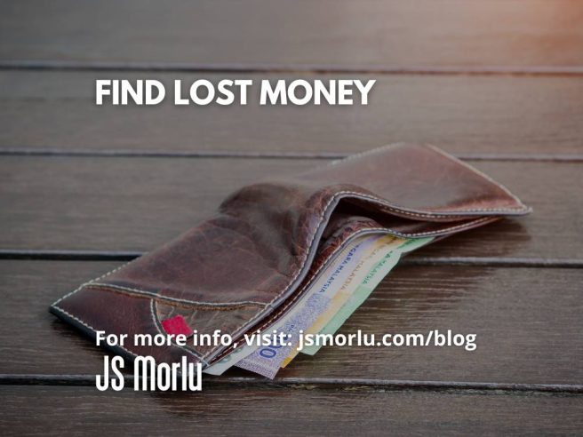 Brown leather wallet with zipper open, lying on sidewalk amidst scattered bills - lost money.