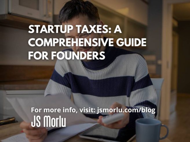 A man sitting at a table with a calculator and a laptop - Startup Taxes